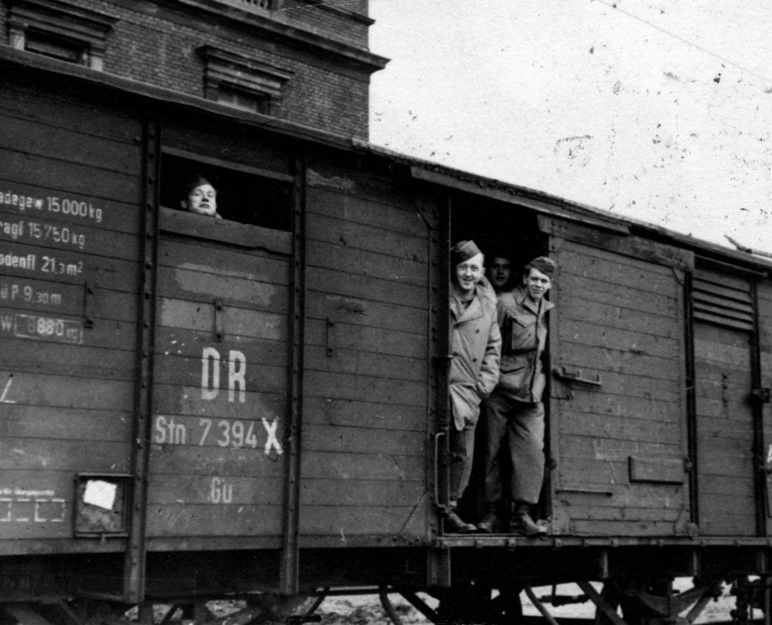 GIs aboard a "forty and eight" boxcar in Germany